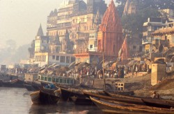 Looking west from Manikarnika at Dashashmaveda Ghat. The orange structure in the center is the long abandoned Prayaga temple