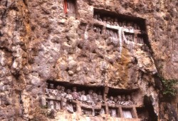 Cliff side effigies in village of Suaya